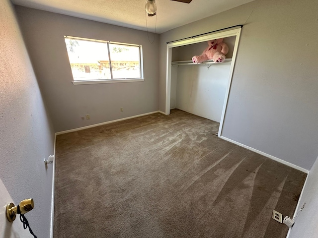 717 Circle Way, Alvin, TX 77511 - unfurnished bedroom with carpet, a closet, and ceiling fan