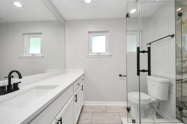 10602 Raydell Dr, Houston, TX 77031 - full bathroom with vanity, healthy amount of natural light, marble look tiles, recessed lighting, and a shower stall