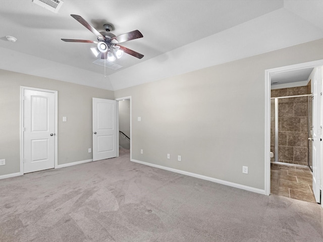 16020 Fountainview Dr Unit 21, Montgomery, TX 77356 - unfurnished bedroom with carpet, ensuite bathroom, and ceiling fan
