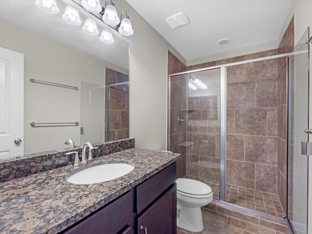 16020 Fountainview Dr Unit 21, Montgomery, TX 77356 - full bath featuring vanity, a stall shower, and tile patterned floors