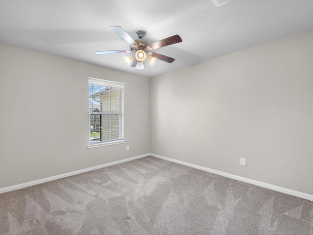 16020 Fountainview Dr Unit 21, Montgomery, TX 77356 - carpeted empty room with ceiling fan and baseboards