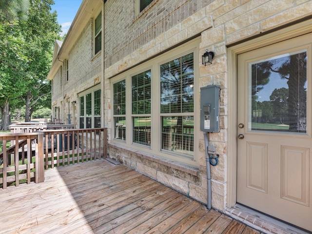 16020 Fountainview Dr Unit 21, Montgomery, TX 77356 - wooden deck featuring electric panel