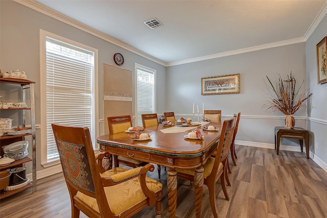 1407 Ella Cir, Houston, TX 77090 - dining space with crown molding and wood finished floors