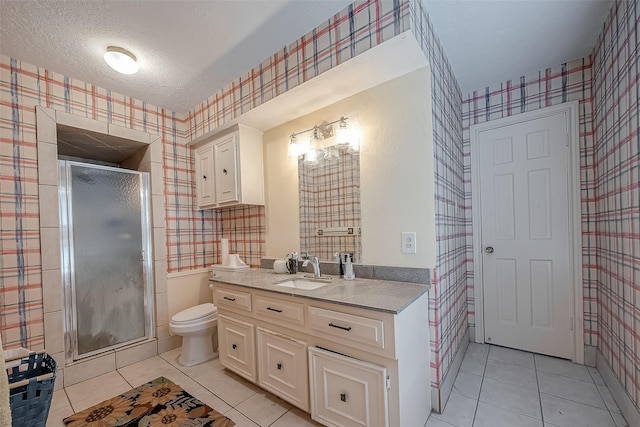 1407 Ella Cir, Houston, TX 77090 - full bathroom with wallpapered walls, tile patterned flooring, vanity, a stall shower, and a textured ceiling