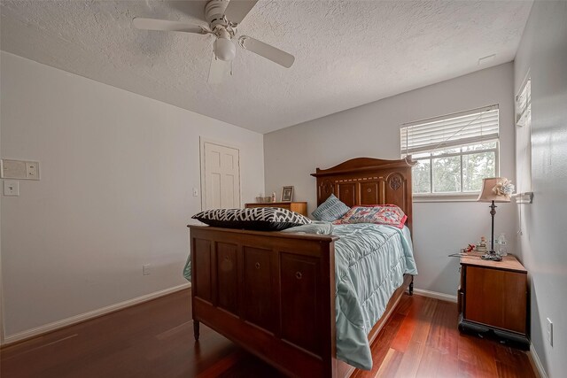 1407 Ella Cir, Houston, TX 77090 - bedroom with wood finished floors, a textured ceiling, and ceiling fan
