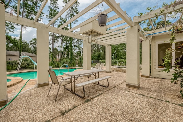 1407 Ella Cir, Houston, TX 77090 - view of patio / terrace with a pergola and a pool with connected hot tub