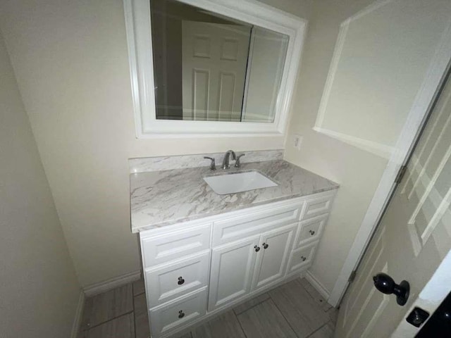 4938 Magnolia Ln, Old River Winfree, TX 77535 - bathroom with vanity and baseboards