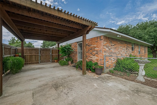 1640 Shepherd St, Hempstead, TX 77445 - view of patio with a carport