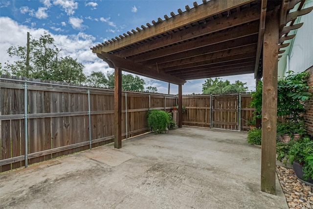 1640 Shepherd St, Hempstead, TX 77445 - view of patio with a carport and a gate