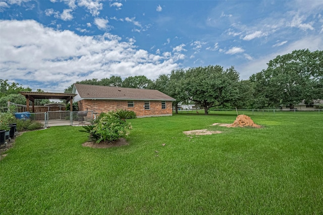 1640 Shepherd St, Hempstead, TX 77445 - view of yard featuring a carport and a gate