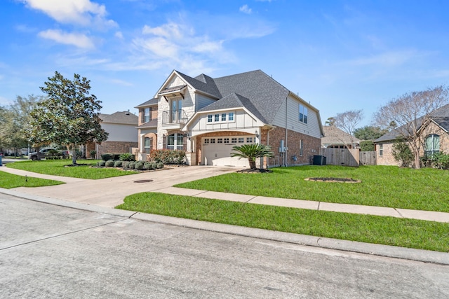 13815 Lake Livingston Dr, Houston, TX 77044 - view of front of home featuring driveway, brick siding, an attached garage, board and batten siding, and a shingled roof