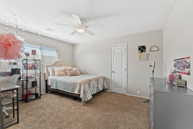 13815 Lake Livingston Dr, Houston, TX 77044 - bedroom with light colored carpet and a ceiling fan