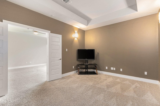 28622 Mountain Timber Ct, Fulshear, TX 77441 - living room with carpet, ceiling fan, and a tray ceiling