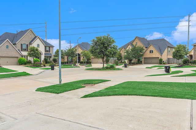 28622 Mountain Timber Ct, Fulshear, TX 77441 - view of yard featuring a garage, driveway, and a residential view