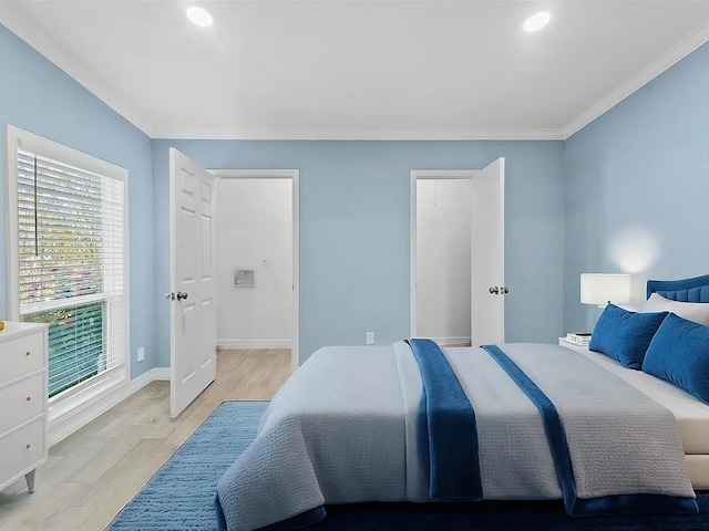 4418 Dacca Dr, Houston, TX 77047 - bedroom with light wood-style flooring, ornamental molding, and recessed lighting