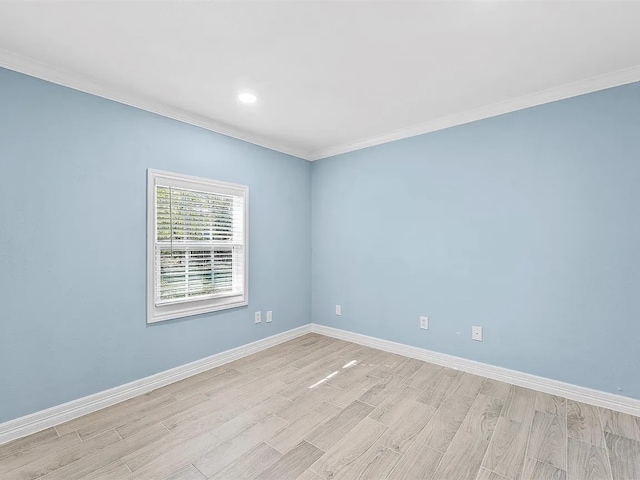 4418 Dacca Dr, Houston, TX 77047 - spare room with ornamental molding, light wood-type flooring, and recessed lighting