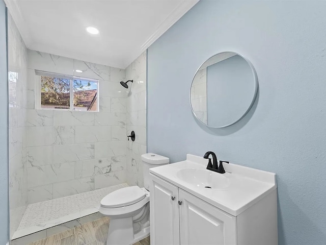 4418 Dacca Dr, Houston, TX 77047 - full bath featuring vanity, tiled shower, and wood finished floors