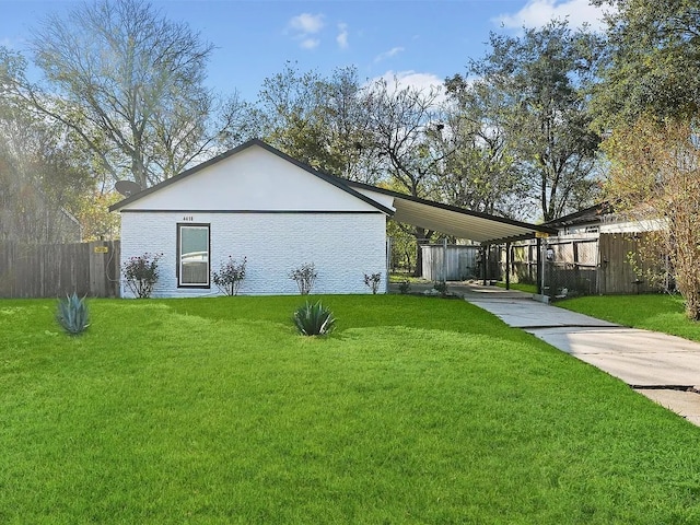 4418 Dacca Dr, Houston, TX 77047 - view of side of property with a carport