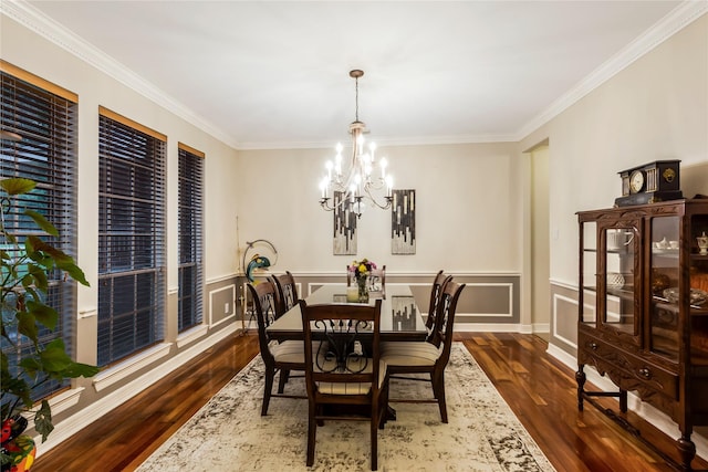 14419 Timbergreen Dr, Magnolia, TX 77355 - dining room featuring ornamental molding, a chandelier, dark wood finished floors, and a wainscoted wall