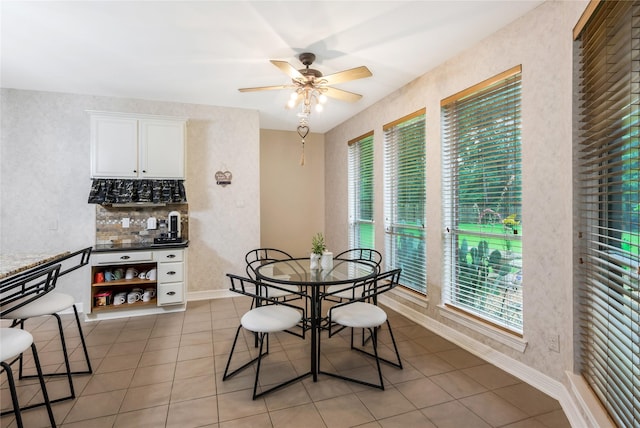 14419 Timbergreen Dr, Magnolia, TX 77355 - dining area with healthy amount of natural light, ceiling fan, and light tile patterned floors