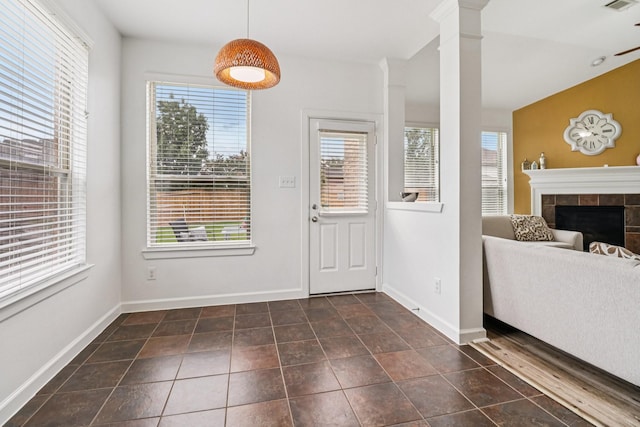 4003 Autumn Pines Trl, Houston, TX 77084 - foyer featuring decorative columns and a fireplace