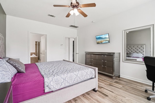 4003 Autumn Pines Trl, Houston, TX 77084 - bedroom with wood finished floors, ensuite bath, and a ceiling fan