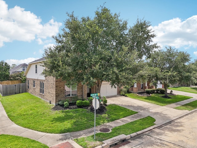 4003 Autumn Pines Trl, Houston, TX 77084 - obstructed view of property with brick siding, concrete driveway, and an attached garage