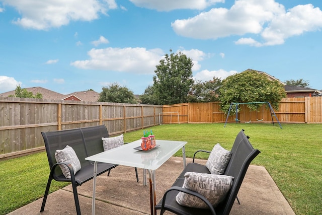 4003 Autumn Pines Trl, Houston, TX 77084 - fenced backyard with a playground and a patio