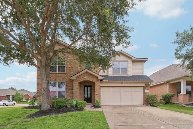 4003 Autumn Pines Trl, Houston, TX 77084 - traditional-style home featuring brick siding, an attached garage, driveway, and a front yard