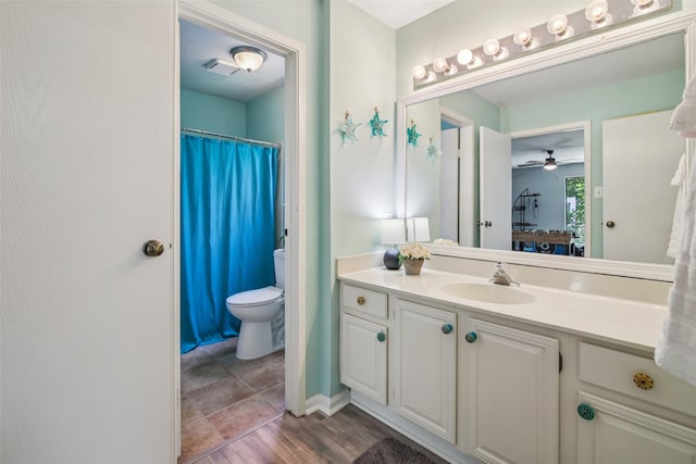 5210 Creek Shadows Dr, Houston, TX 77339 - full bathroom with vanity, a ceiling fan, a shower with shower curtain, and ensuite bath