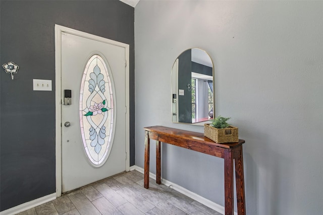 5210 Creek Shadows Dr, Houston, TX 77339 - foyer entrance featuring baseboards and arched walkways