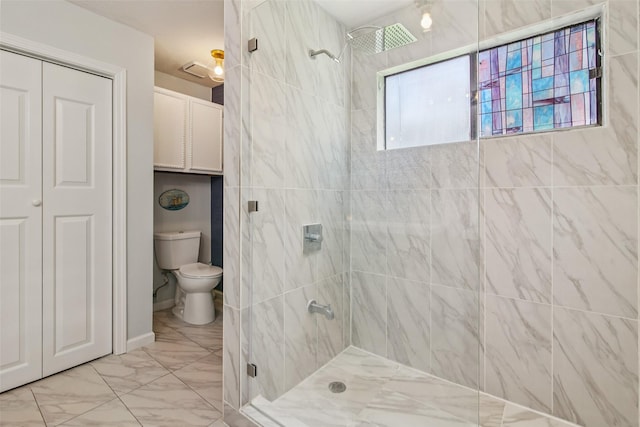 5210 Creek Shadows Dr, Houston, TX 77339 - full bathroom with a stall shower, marble look tiles, and a closet