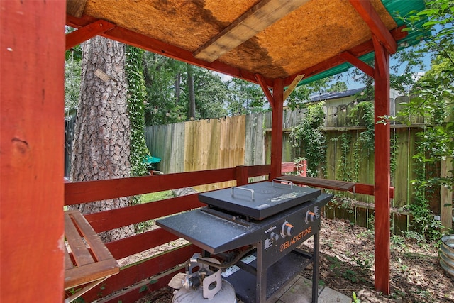 5210 Creek Shadows Dr, Houston, TX 77339 - wooden terrace with a grill