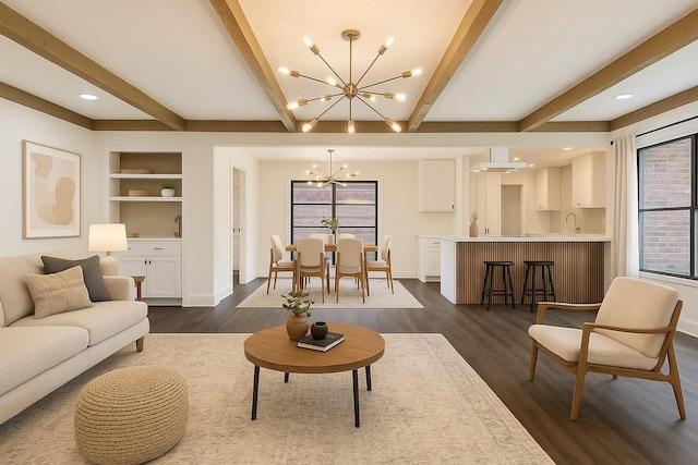 10602 Tenneta Dr, Houston, TX 77099 - living room with a chandelier, beamed ceiling, dark wood-type flooring, built in shelves, and recessed lighting