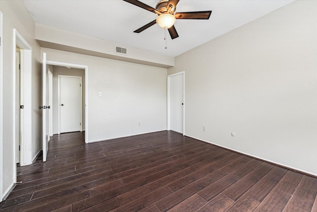 1881 Bering Dr Unit 83, Houston, TX 77057 - unfurnished room with ceiling fan and dark wood-style flooring