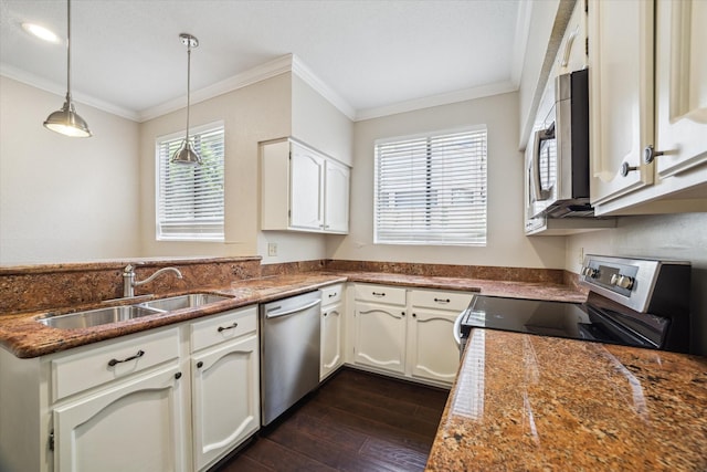 1881 Bering Dr Unit 83, Houston, TX 77057 - kitchen with appliances with stainless steel finishes, dark wood finished floors, ornamental molding, pendant lighting, and white cabinets