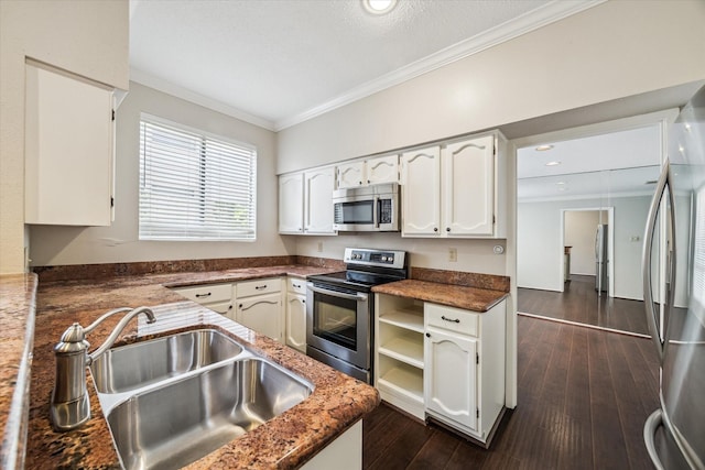 1881 Bering Dr Unit 83, Houston, TX 77057 - kitchen featuring stainless steel appliances, ornamental molding, white cabinetry, and dark wood-style floors