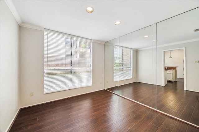 1881 Bering Dr Unit 83, Houston, TX 77057 - unfurnished room featuring ornamental molding, wood finished floors, and recessed lighting