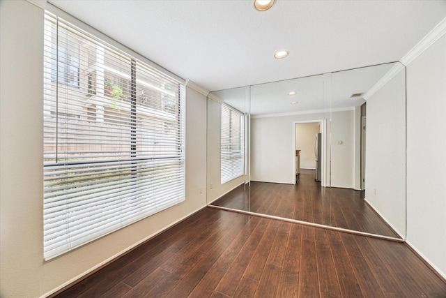 1881 Bering Dr Unit 83, Houston, TX 77057 - empty room featuring crown molding, wood finished floors, and recessed lighting