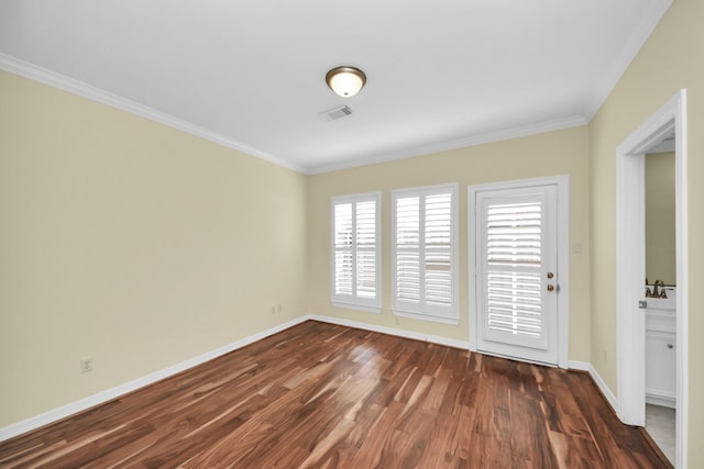 2930 Brompton Square Dr, Houston, TX 77025 - spare room featuring dark wood-type flooring and crown molding