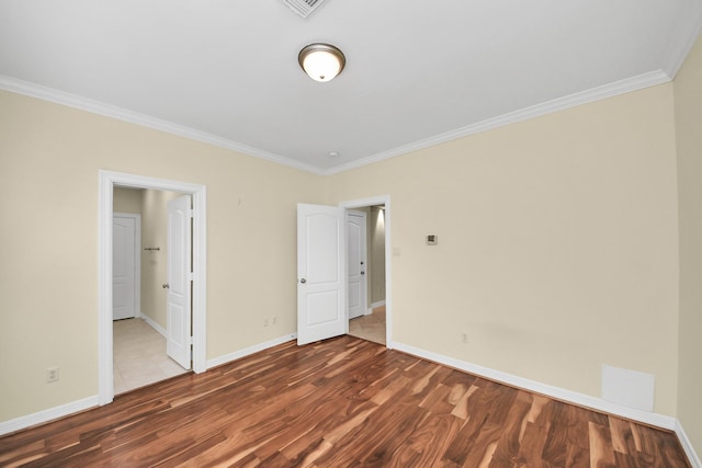 2930 Brompton Square Dr, Houston, TX 77025 - unfurnished bedroom with crown molding and wood finished floors