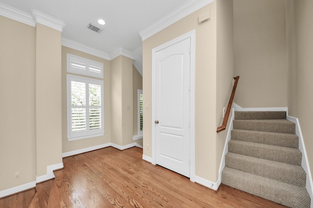 2930 Brompton Square Dr, Houston, TX 77025 - stairs with ornamental molding, wood finished floors, and recessed lighting