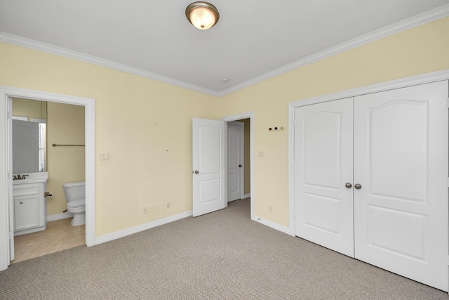 2930 Brompton Square Dr, Houston, TX 77025 - unfurnished bedroom with crown molding, a closet, carpet, and ensuite bathroom