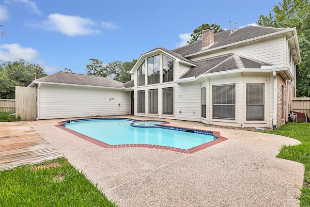 12102 Moorcreek Dr, Houston, TX 77070 - view of swimming pool with an in-ground hot tub and a patio area