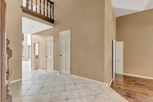 12102 Moorcreek Dr, Houston, TX 77070 - foyer featuring a high ceiling and light tile patterned floors