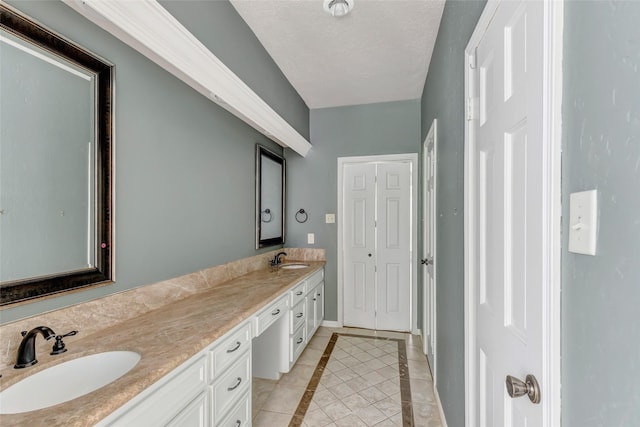 12102 Moorcreek Dr, Houston, TX 77070 - bathroom with double vanity, tile patterned flooring, and inlaid floor details