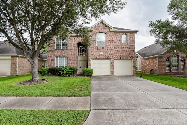 2814 Edgewick Elm St, Fresno, TX 77545 - traditional-style home featuring a front yard, a garage, driveway, and brick siding