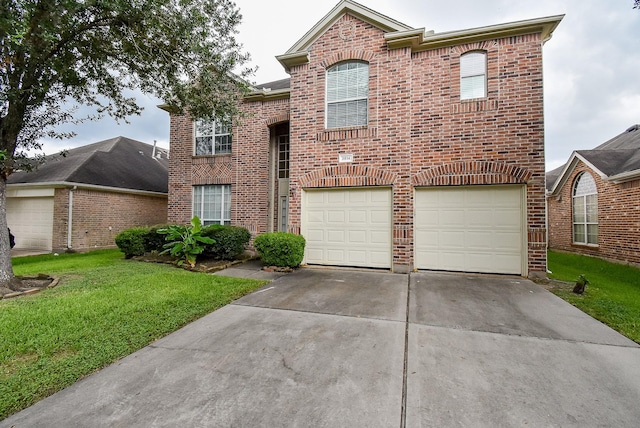 2814 Edgewick Elm St, Fresno, TX 77545 - traditional-style home featuring brick siding, an attached garage, concrete driveway, and a front yard