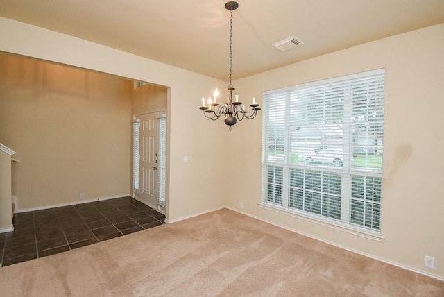 2814 Edgewick Elm St, Fresno, TX 77545 - unfurnished dining area featuring a chandelier, carpet flooring, and tile patterned floors