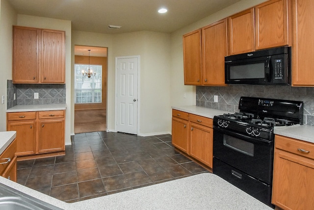 2814 Edgewick Elm St, Fresno, TX 77545 - kitchen with black appliances, a chandelier, backsplash, light countertops, and recessed lighting